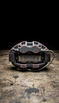 Race-Used Brake Caliper With Track Scars